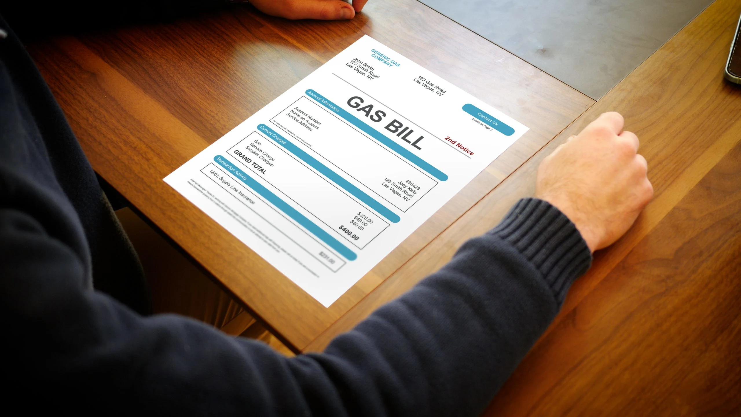 homeowner reviewing overdue utility bill