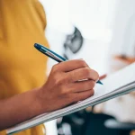 woman filling out property inspection checklist